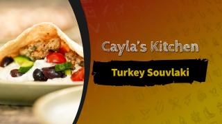 Image of turkey souvlaki on a plate