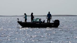 People on boat fishing