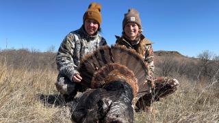 Jackie and Cayla with harvested turkey