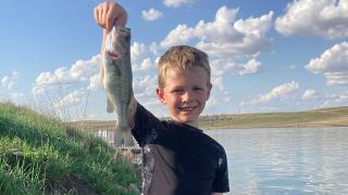 Rodney holding fish